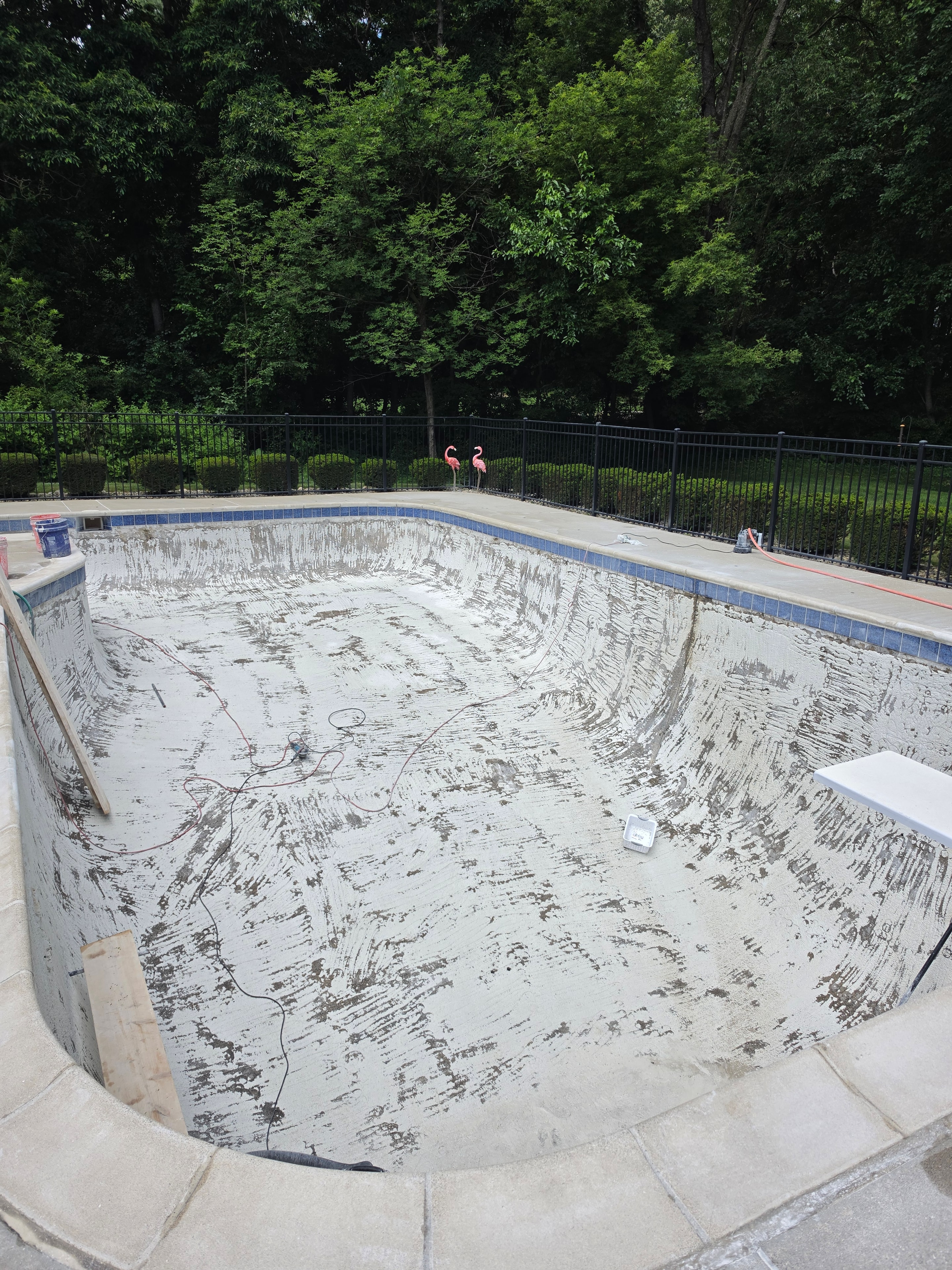 Pool surface before hydroblasting — worn and stained